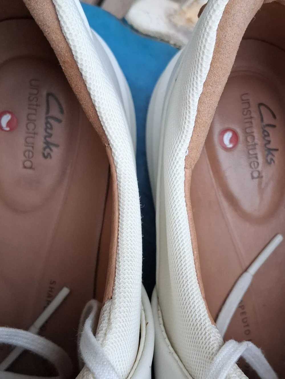 Womens White Casual Sneakers with Tan Accents. Body of Shoe Winter White.
